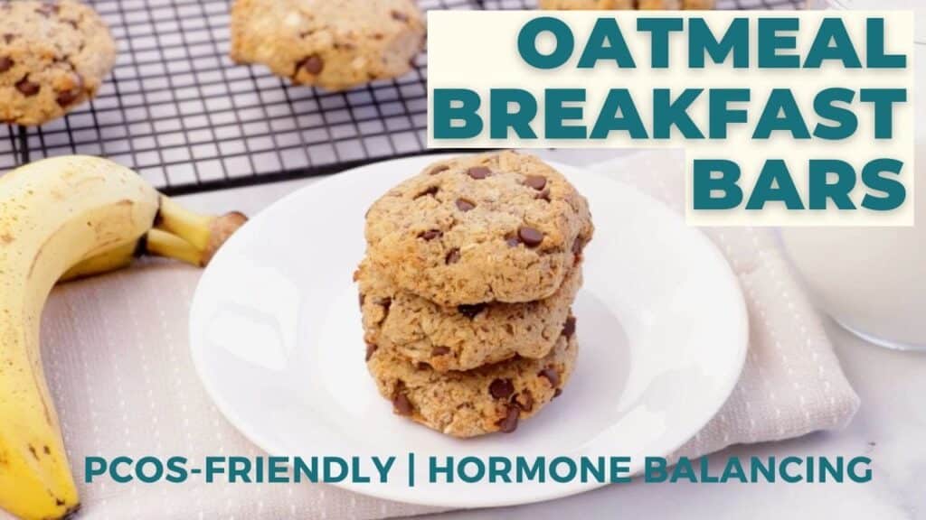 White plate with a stack of PCOS-friendly oatmeal banana chocolate chip breakfast bars for insulin resistance.